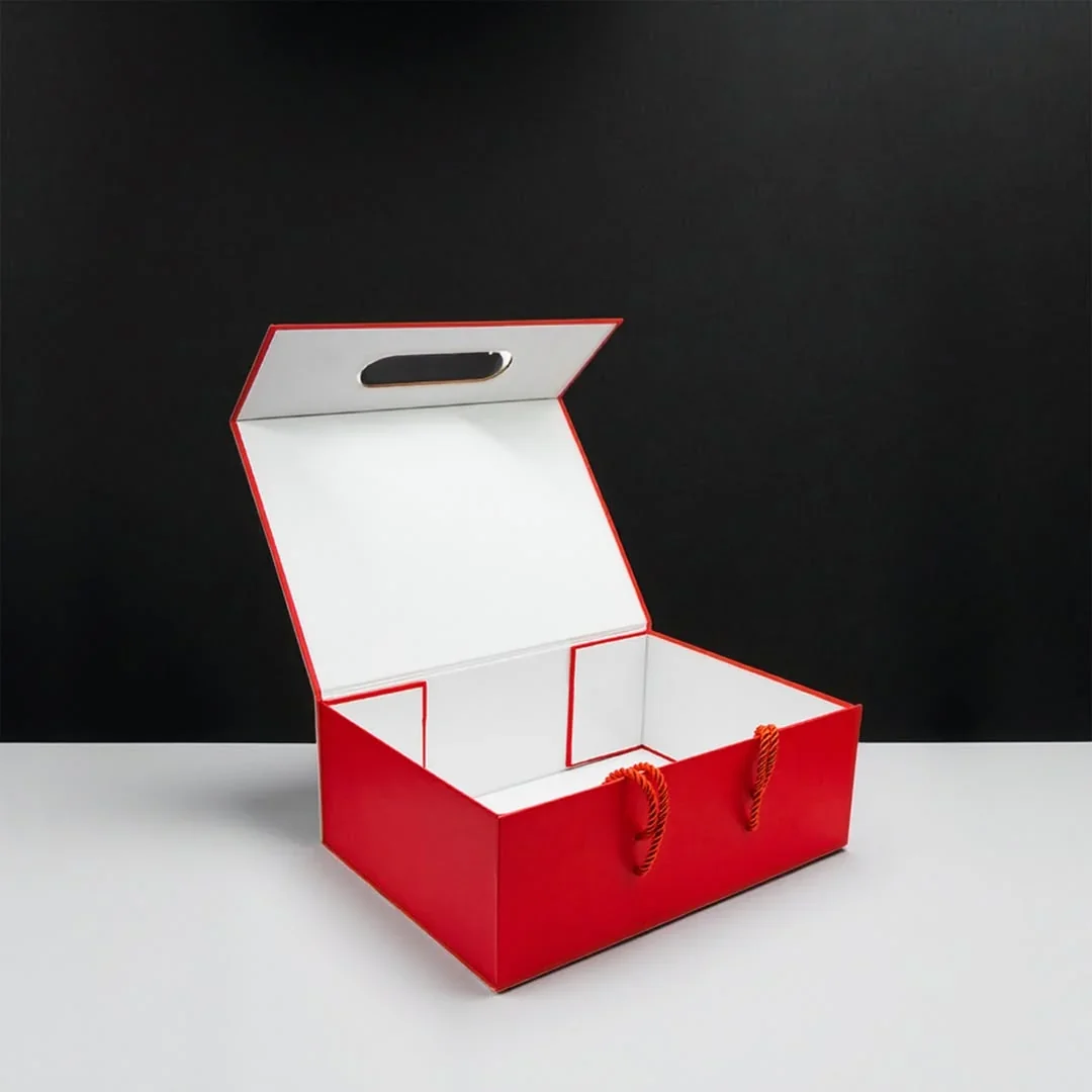 Coffret rigide pliable avec poignée