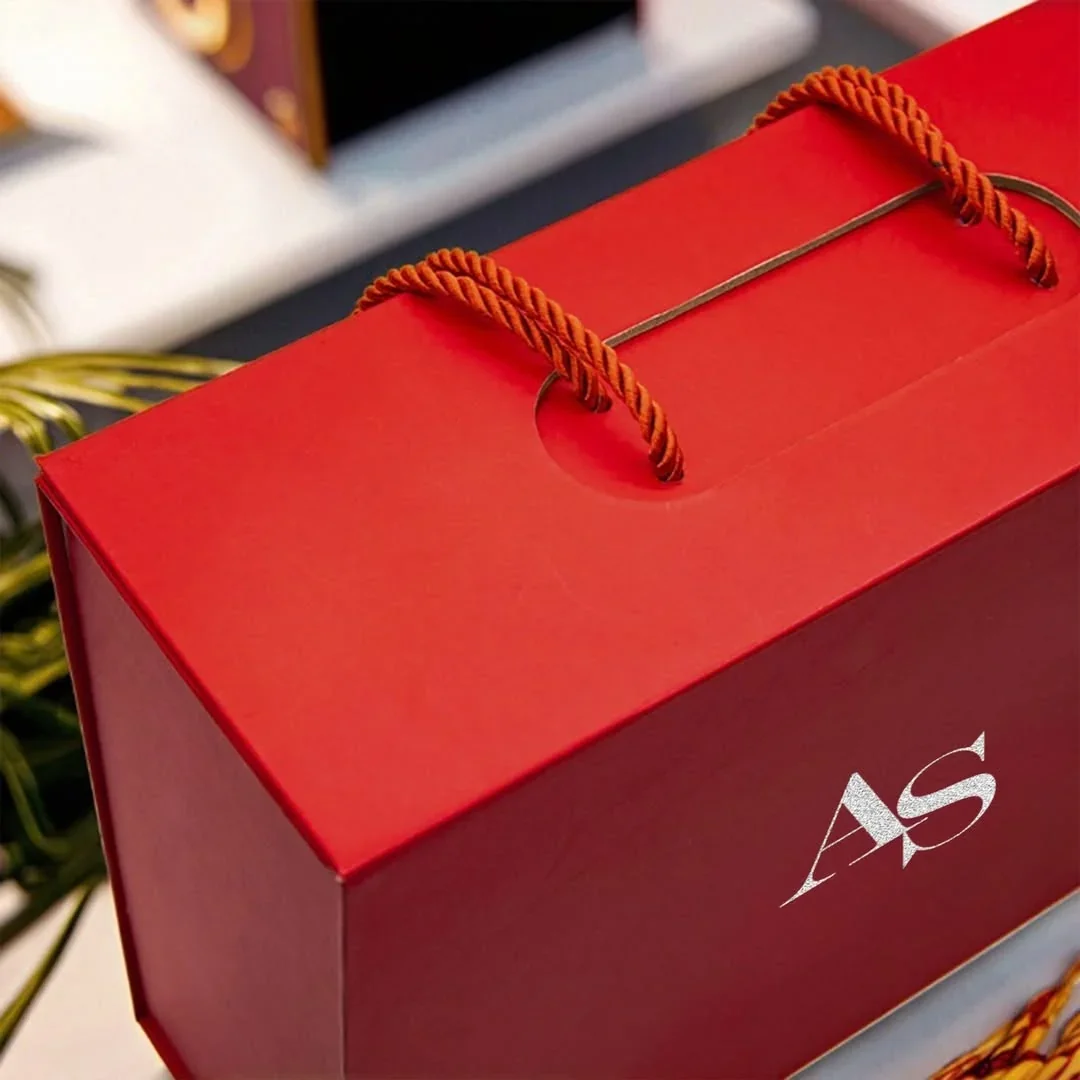 Coffret rigide pliable avec poignée